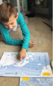 Child following the homeschool schedule
